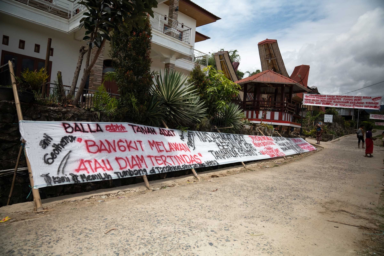 Bittuang-post-featured-image-building-with-advocacy-sign-in-front