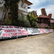 Bittuang-post-featured-image-building-with-advocacy-sign-in-front